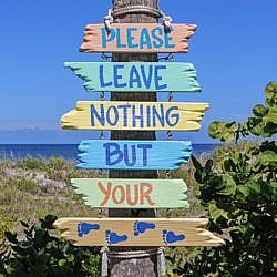 Sign: Please leave nothing but your footprints.