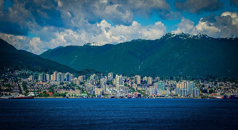 Vancouver cityscape with mountains in the backdrop