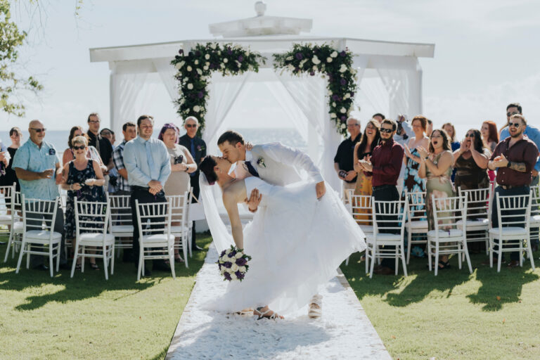 Wedding couple with their guests at the Dreams La Romana wedding gazebo